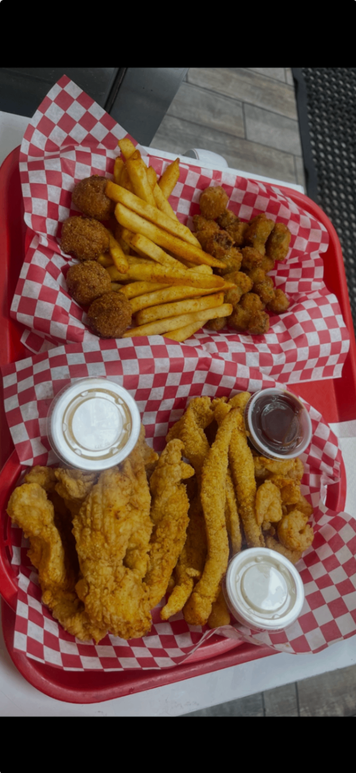 Classic combo red tray with chicken tenders, shrimp, catfish and sides